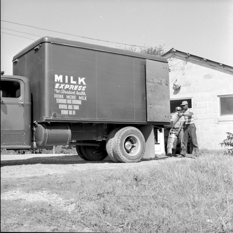 052_the cans to load the truck. (1954).jpg